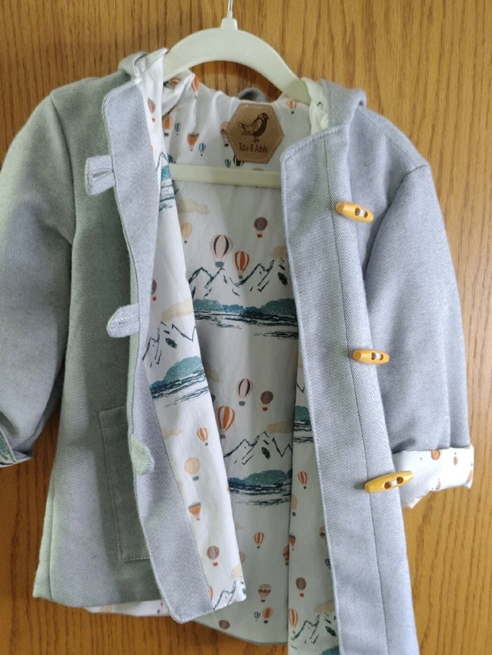 Kids Hooded Toggle Coat in Light Gray with Hot Air Balloon Lining